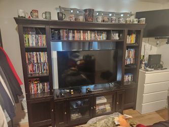 Bed frame. Dresser. Nightstand. Entertainment center. Couch. For sale