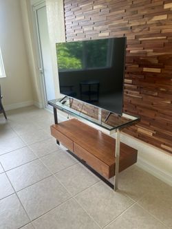 Very nice TV stand. Fits 55” TV