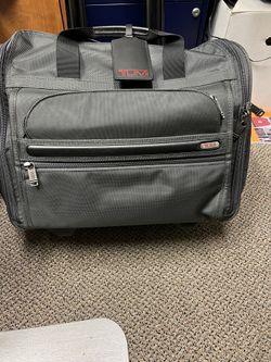 Tumi Boarding duffel and Handbag