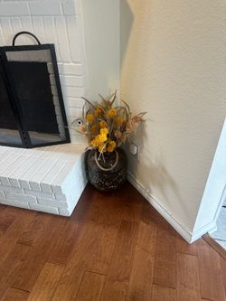 beautiful vase and artificial flowers