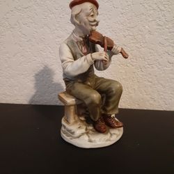 porcelain man with violin