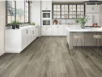 STAINMASTER 22-mil x 9-in W x 60-in L Waterproof Luxury Vinyl Plank Flooring