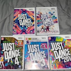 Wii U With Remotes, Remote Chargers And Games