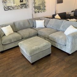 Light Gray Sectional & Ottoman 