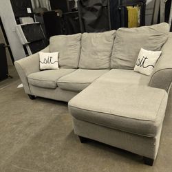 *Same Day Delivery Available!* 
Grey Reversible Chaise Ashley Furniture Sofa