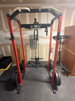 Squat rack/ weight plates/ Olympic bar