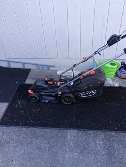 Lawnmower Scott's 14 inch , 20 volt with battery and charger $50