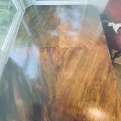 vintage wood dining table with an extension leaf, manufacturer by Drexel Heritage
