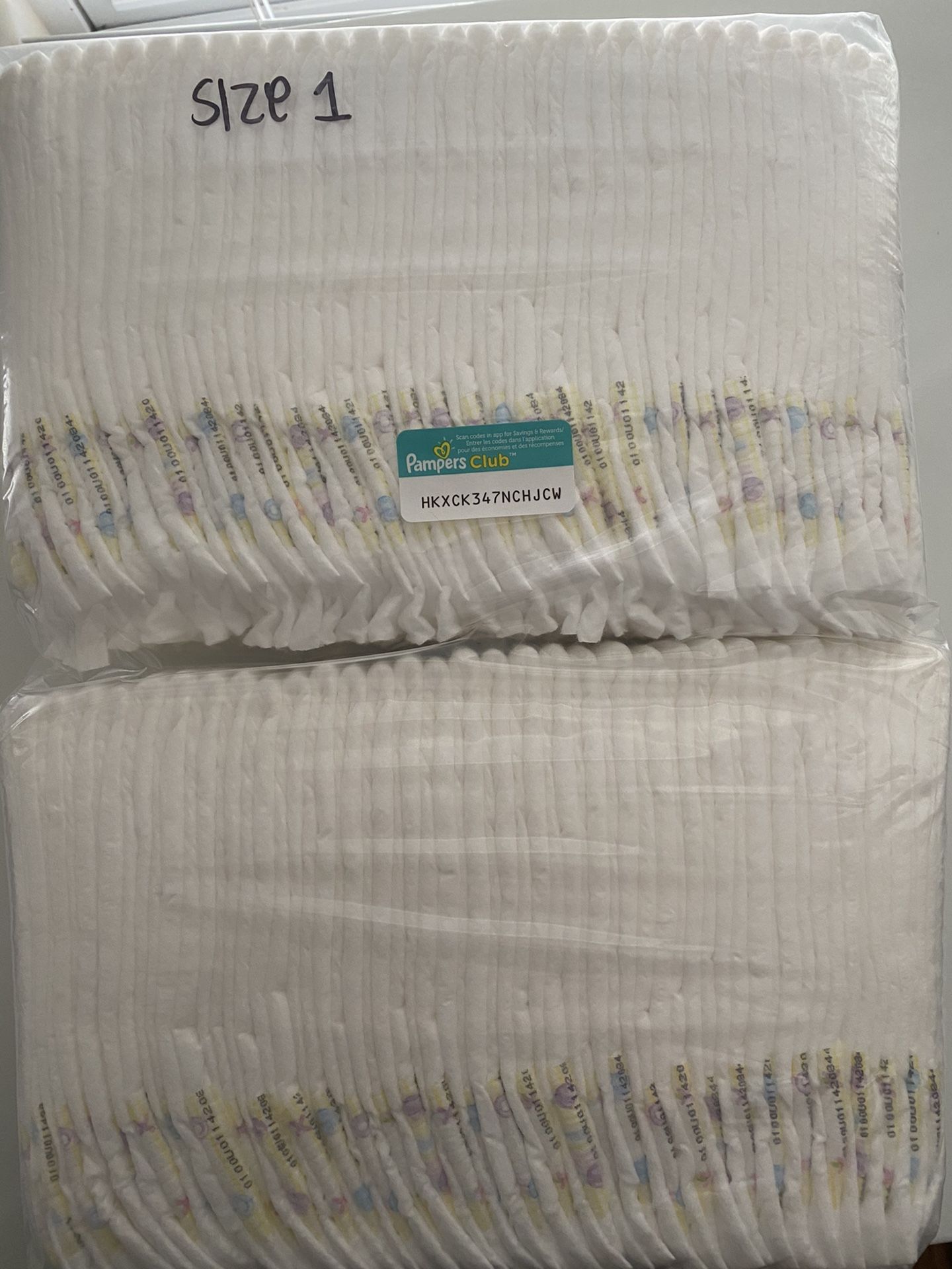 Size 1 pampers swaddlers - 66 diapers