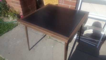 Wood table with vinyl top