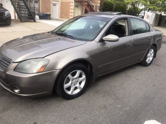 Nissan Altima 2006 Gold 154k runs and drives powerful clean title Can use new brakes but not bad no issues no lights on dash