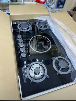 4-burner gas cooker with 1 electric hot plate