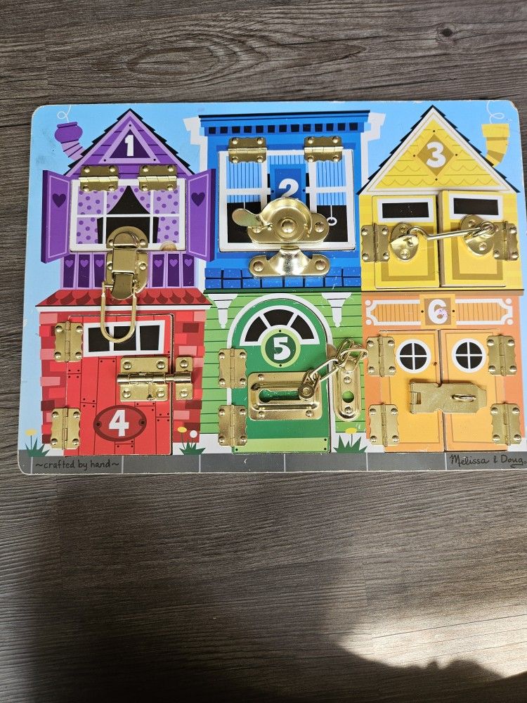 Melissa & Doug Latches Board