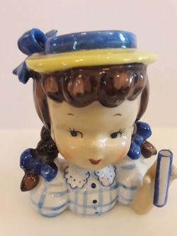 Old blue umbrella girl damage to bow are other vases bundle deals available