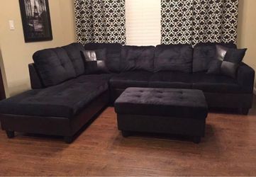 Charcoal black microfiber sectional couch and ottoman