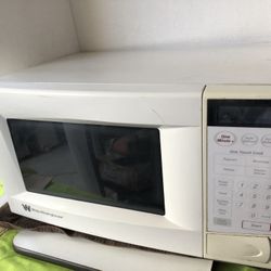 Like  New White Westinghouse microwave dimensions 19” W X 14”D X 21” H  Model WMN 17779