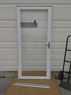 Nice White Storm Door With Decorative Glass Etching 36" X 80" Left Hand Swing Very Clean Like New. 