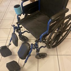Wheelchair with adjustable footrest