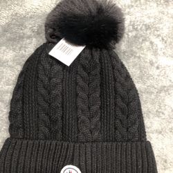 Black Moncler pom-pom hat