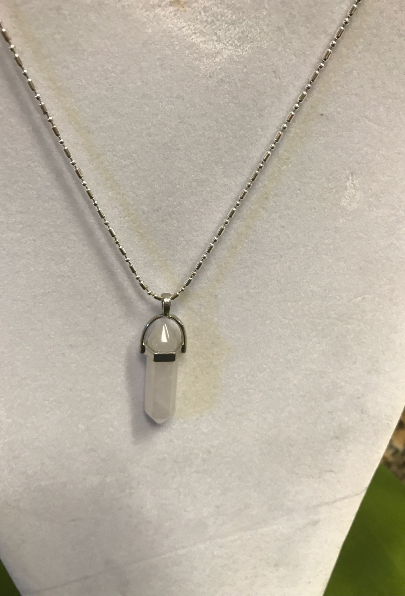 Rose quartz pendant with sterling silver chain. 18 inches