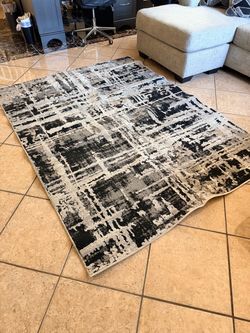 LIKE NEW Area Rug 5’ x 7’ from Ashley Furniture