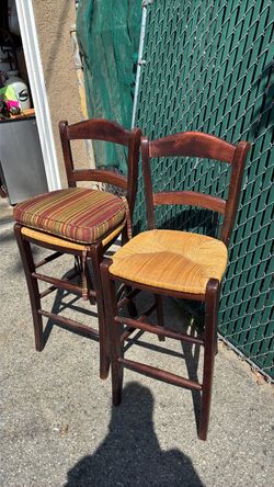 Four barstools with seat covers cushions