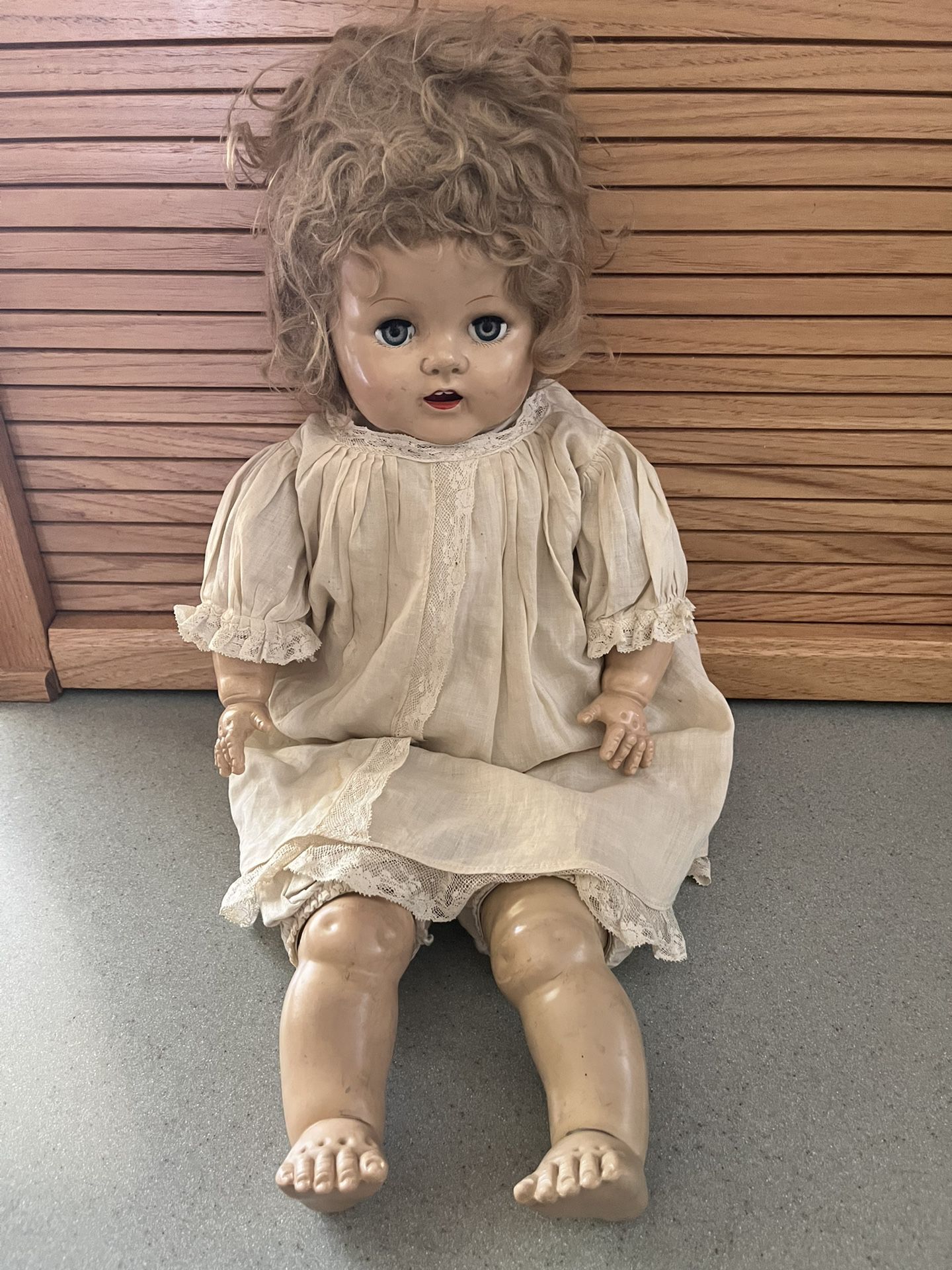 Antique P 200 Ideal baby doll-22”. Cry box still works. Original clothes.