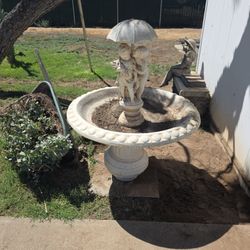 Boy And Girl Under Umbrella Water Fountain 