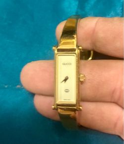Gucci gold watch