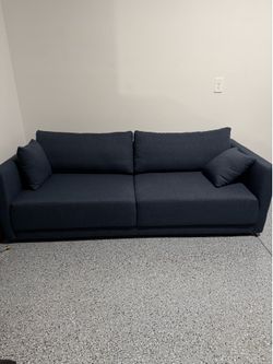 Excellent condition 3 seater sofa. Navy blue performance fabric.