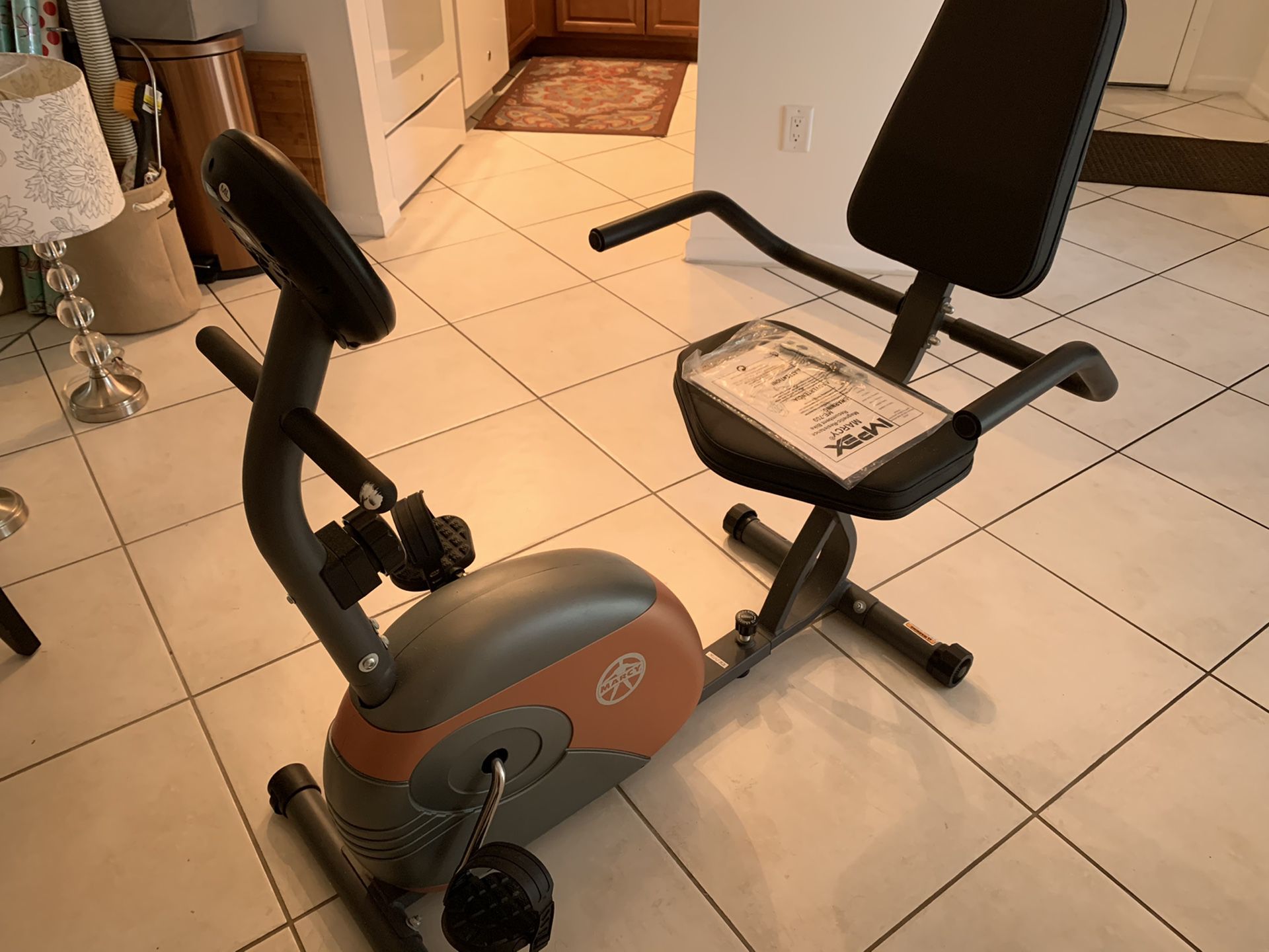 “Marcy” recumbent exercise bike. ME-709. Excellent condition. 3 mos. old. $75