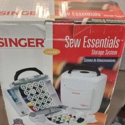 Brand New. Singer Thread Holder Plus  Thread Inside Box .