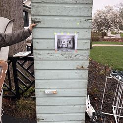 Antique wooden repurposed barn door decorative rustic furniture previously used to hang photos horizontally beautiful plank or shiplap construction  f