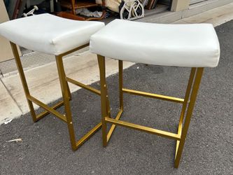 2 white faux leather and gold metal counter height stools