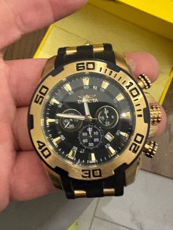 an Invicta Pro Diver Scuba 50mm Chronograph Watch (Model 22340)