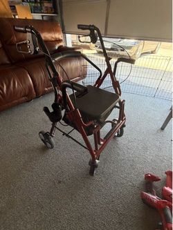 Red Rollator Walker with Seat, Storage Bag, Working Hand Brakes & Fold-Out Footrest