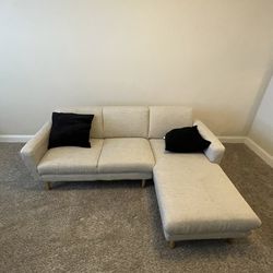 Two smaller cream/white couches