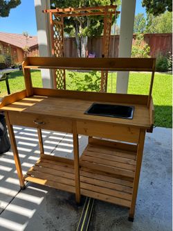 Outdoor Wooden Potting Bench / Garden Workstation - $40
