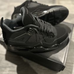 Black Cat Jordan 4s