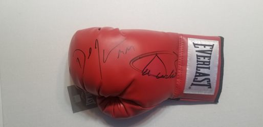 Autographed boxing glove Saul "Canelo" Alvarez and Daniel "Miracle Man" Jacobs
