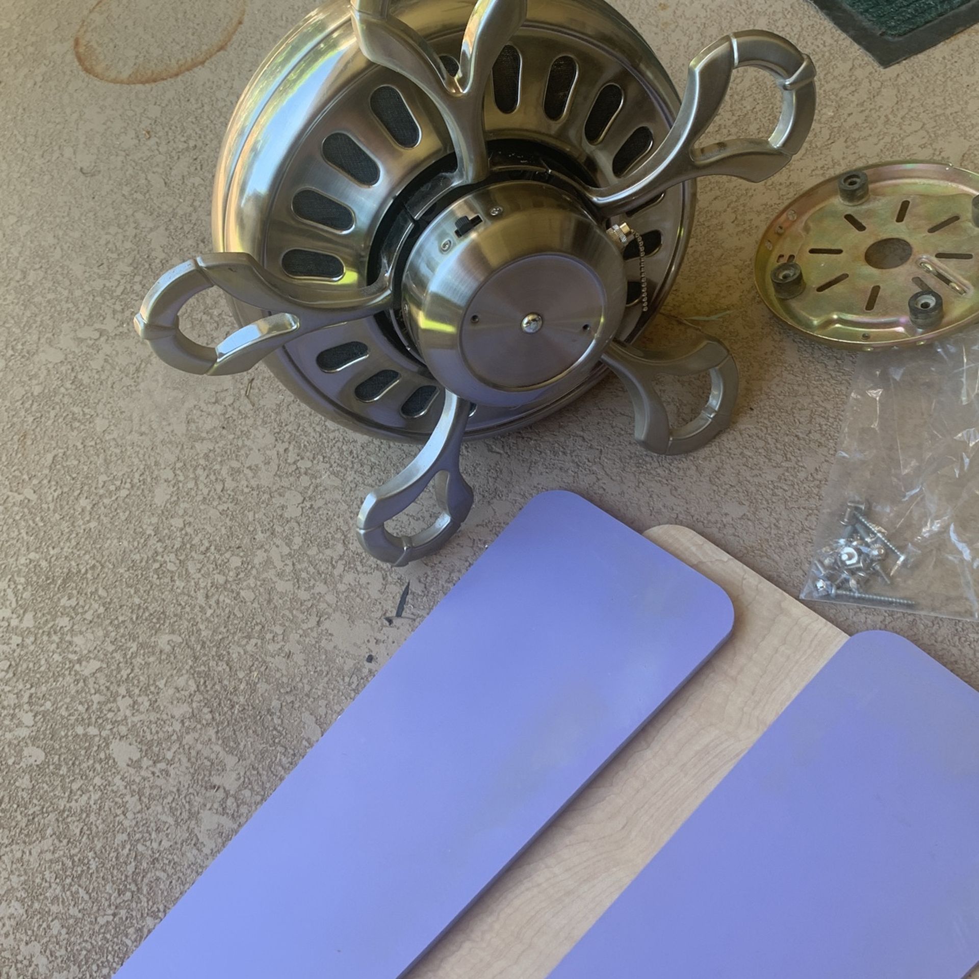 Nice 48 inch hunter ceiling fan five blades your choice of purple or very light tan asking $25. Thank you.