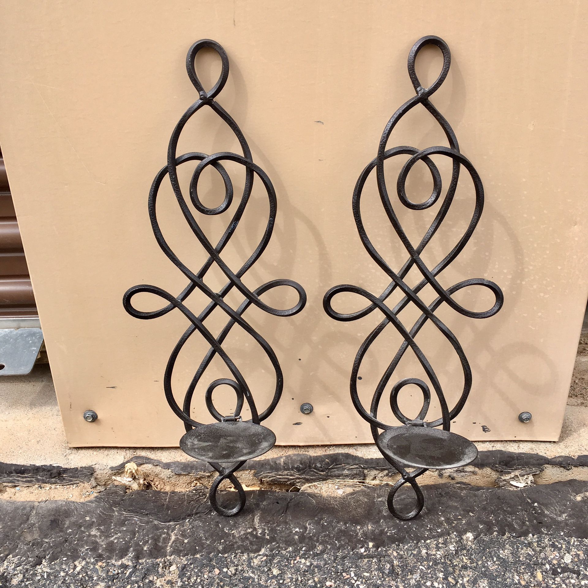 2 wrought iron candle holders 18"h