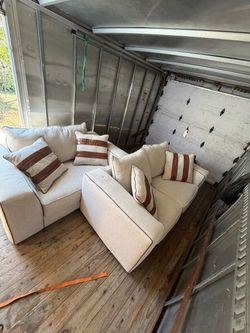 Cream Boucle Sectional Sofa with Accent Pillows