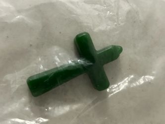 Hand carved green, jade cross
