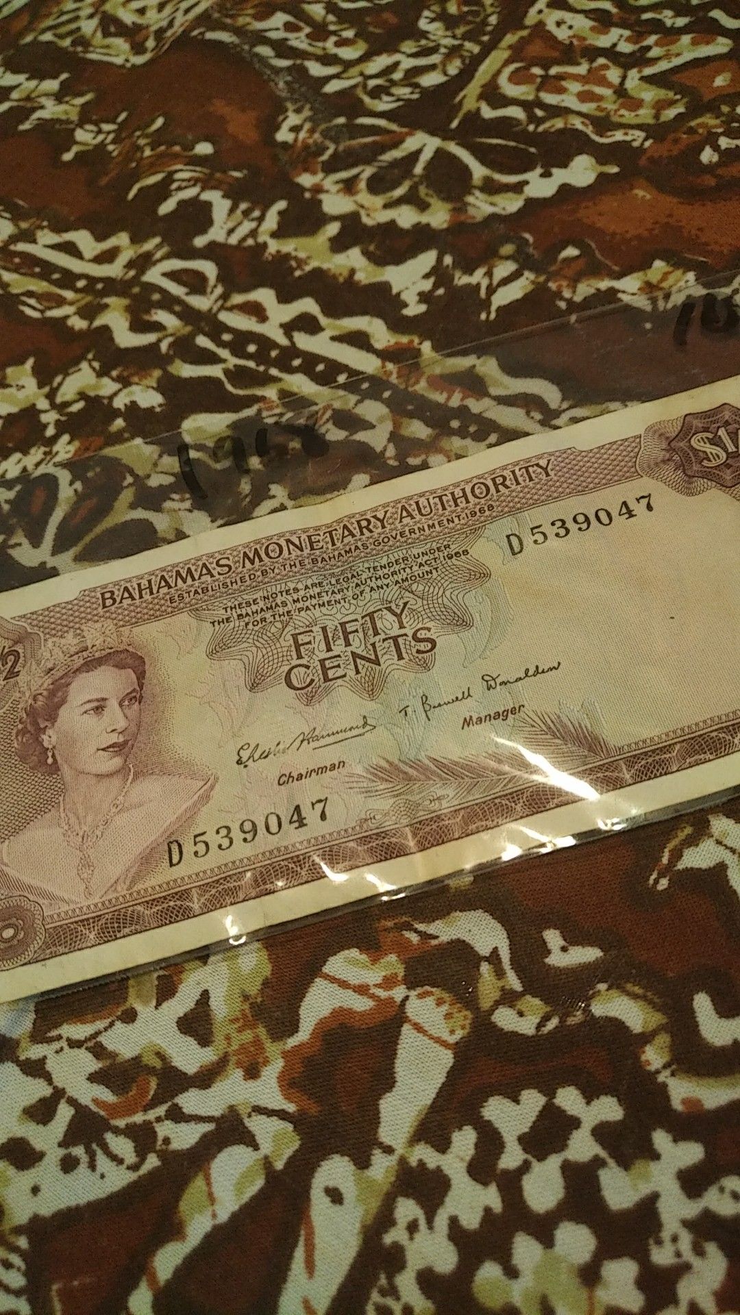 Vintage 1968 Bahamas 50 cent banknote.