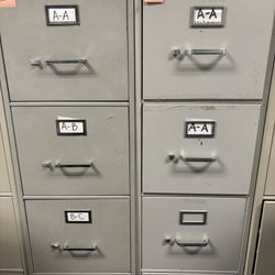 Two Greg Filing Cabinets