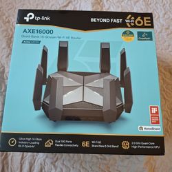TP-link AXE16000 4-band New in open box, bought two of these but only needed one 
