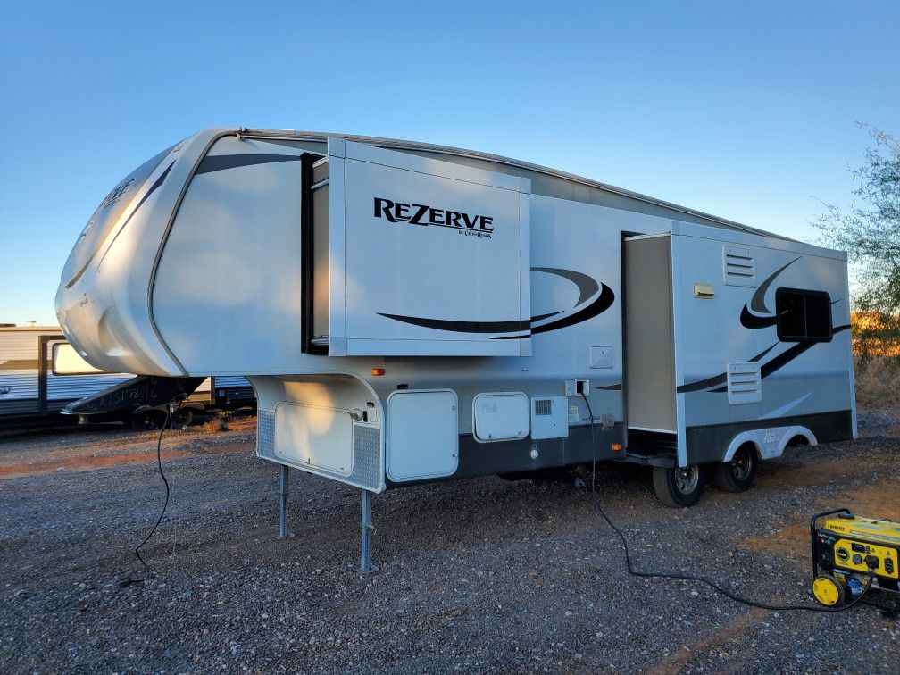 2016 rezerve 30th 5th wheel 3 slides 7500 lb clean trailer delivered