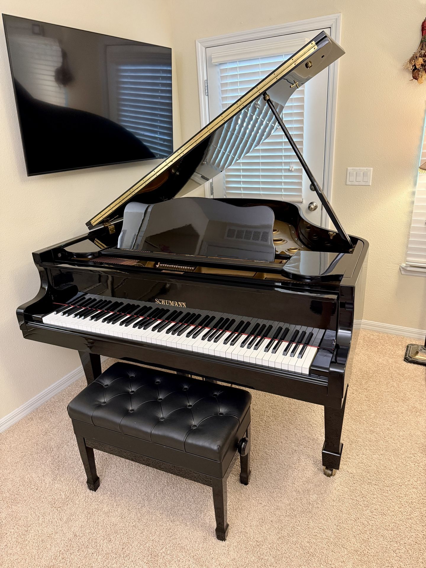 Shiny Black Shumann Grand Piano