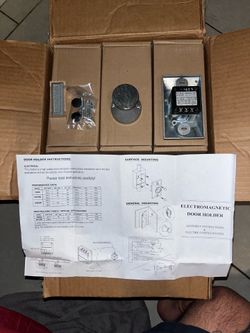 Electromagnetic door holder